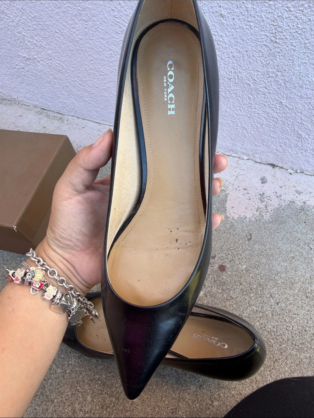Coach sleek black